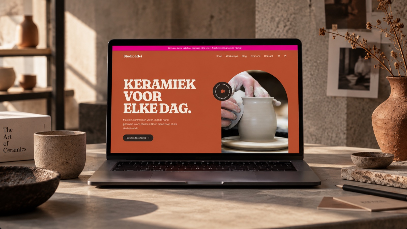 Studio Klei ceramics webshop shown on a laptop