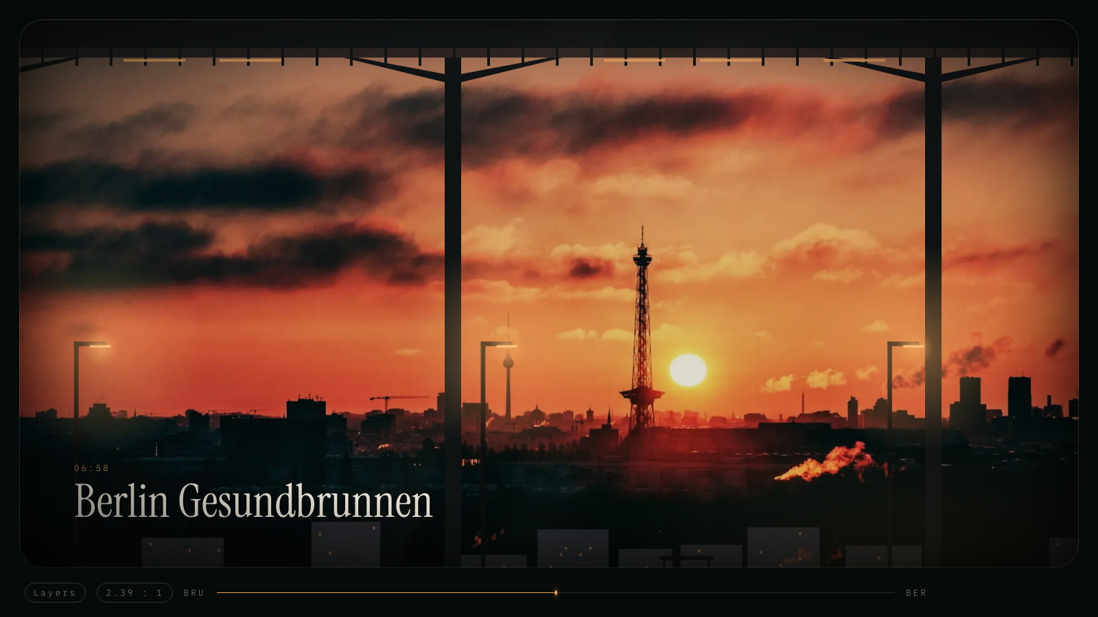 Night Train arriving in Berlin: the Funkturm against an orange sunrise, seen through the train window