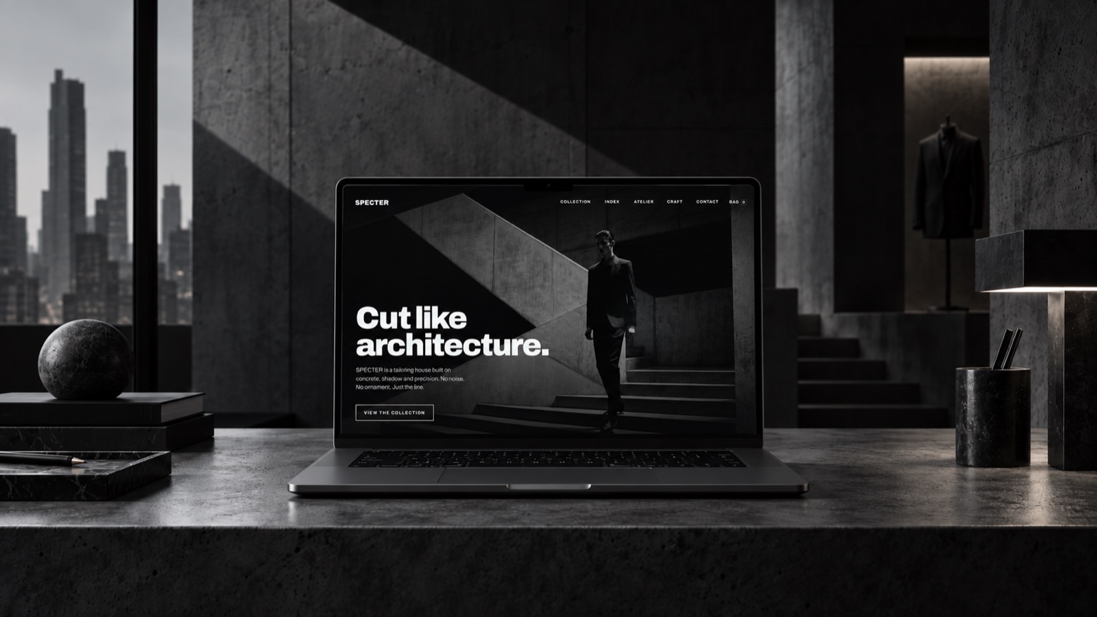 Specter webshop homepage on a laptop in a dark concrete studio
